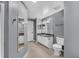 Simple bathroom featuring tiled floors, granite countertops, and modern lighting at 3406 Soho St # 201, Orlando, FL 32835