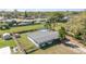 Aerial view of a home showing the backyard, lawn and neighborhood at 395 Bearcreek Dr, Bartow, FL 33830