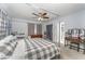 Bedroom showcasing a four poster bed, carpeted floors, natural lighting, and a vanity table at 395 Bearcreek Dr, Bartow, FL 33830