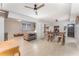 Spacious living room with modern ceiling fans and an open floor plan to an entryway at 395 Bearcreek Dr, Bartow, FL 33830