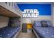 Fun ' bedroom with a Star Wars theme and bunk beds at 432 Ocean Course Ave, Davenport, FL 33896