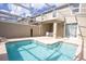 Private backyard pool with a covered patio and dining area at 432 Ocean Course Ave, Davenport, FL 33896