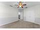 This bedroom features neutral-colored walls, carpet flooring, and a modern ceiling fan at 5189 Fenwood Ln, Orlando, FL 32814