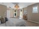 Bedroom featuring neutral walls, carpet floors, and natural light at 5189 Fenwood Ln, Orlando, FL 32814