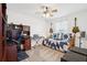 Bedroom with a bed, desk, keyboard and guitars at 5269 Red Coral Cir, Mount Dora, FL 32757