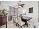 Elegant dining room with modern light fixture and neutral decor at 5314 Adair Oak Dr, Orlando, FL 32829