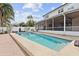 Backyard pool with view of the screened-in porch at 5314 Adair Oak Dr, Orlando, FL 32829