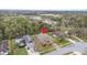 Aerial view of a house in a suburban neighborhood with lush greenery and convenient access to amenities at 5477 Glen Oak Pl, Sanford, FL 32771