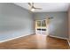 Bedroom featuring sliding glass doors leading to the patio at 5477 Glen Oak Pl, Sanford, FL 32771