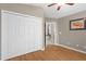 Bedroom featuring closet and views to the living space in the home at 5477 Glen Oak Pl, Sanford, FL 32771