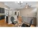 Dining space adjacent to kitchen and living room with hardwood floors at 5477 Glen Oak Pl, Sanford, FL 32771