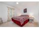 Bedroom with ceiling fan, carpet and bright natural light at 760 Mentmore Cir, Deltona, FL 32738