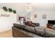 Open concept living room has great lighting and decor, perfect for relaxing and entertaining at 760 Mentmore Cir, Deltona, FL 32738