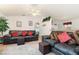 Cozy living room features comfortable seating and decor to relax with Gathering and friends at 760 Mentmore Cir, Deltona, FL 32738
