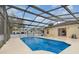 Covered screened pool and patio area has ample seating and room for entertaining friends and Gathering at 760 Mentmore Cir, Deltona, FL 32738