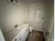 Well-lit bathroom with vanity, sink, toilet, and tiled shower with glass door at 804 Pointe Emerson Blvd, Apopka, FL 32703