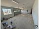 Spacious garage with ample room for parking and storage. Includes a window for natural light at 804 Pointe Emerson Blvd, Apopka, FL 32703