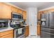 Close up of kitchen with stainless steel appliances and lots of counter space at 9532 Water Fern Cir, Clermont, FL 34711