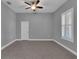 Bedroom with a ceiling fan, and tile floors at 10024 John Adams Way, Orlando, FL 32817