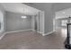 Bright dining room featuring tile flooring, a modern light fixture, and an open floor plan at 10024 John Adams Way, Orlando, FL 32817