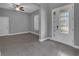 Foyer view towards Gathering room and front door with decorative glass at 10024 John Adams Way, Orlando, FL 32817