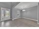 Bright entryway features tile floors, neutral paint, and a front door with decorative glass at 10024 John Adams Way, Orlando, FL 32817