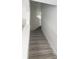 Carpeted stairs with white handrail and walls at 1004 Travertine Ter, Sanford, FL 32771