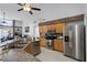 Contemporary kitchen featuring stainless steel appliances and granite countertops at 10809 Oak Glen Cir, Orlando, FL 32817