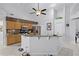 Modern kitchen with stainless steel appliances, granite countertops, and a breakfast bar at 10809 Oak Glen Cir, Orlando, FL 32817