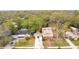 Aerial view of a home showcasing proximity to neighboring properties, mature trees, and well-kept yards at 1920 S Palmetto Ave, Sanford, FL 32771