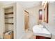 Bathroom with tiled shower and floors and a wood vanity at 1920 S Palmetto Ave, Sanford, FL 32771