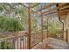 Wooden deck overlooking a brick patio and lush backyard at 1920 S Palmetto Ave, Sanford, FL 32771