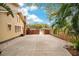 Long driveway leading to the backyard, with a fenced perimeter at 1920 S Palmetto Ave, Sanford, FL 32771