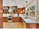 Stylish kitchen featuring stainless steel appliances, custom cabinetry, and sleek countertops at 1920 S Palmetto Ave, Sanford, FL 32771