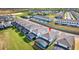 An aerial view of the back of the home highlighting the screen-enclosed patio at 2004 Summer Dr, Davenport, FL 33897