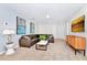 Inviting living room with a brown sectional sofa and modern decor at 2004 Summer Dr, Davenport, FL 33897