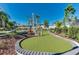 Community mini golf course amidst lush landscaping at 2004 Summer Dr, Davenport, FL 33897