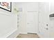 Well-lit mudroom with a bench and cubbies at 2004 Summer Dr, Davenport, FL 33897