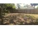 Large backyard with a wooden fence at 218 Perth Ct # A, Winter Springs, FL 32708