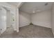 Carpeted room with ceiling fan and open doorway; ' toys are on the floor at 248 Carina Cir, Sanford, FL 32773