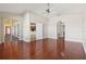 This bedroom features gleaming hardwood floors, recessed lighting and a ceiling fan at 2582 Greenwillow Dr, Orlando, FL 32825