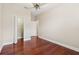 Large bedroom features a ceiling fan, hardwood floors and two closets at 2582 Greenwillow Dr, Orlando, FL 32825