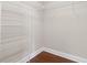 The closet features built-in wire shelving and hardwood floors at 2582 Greenwillow Dr, Orlando, FL 32825