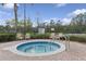 Relaxing outdoor hot tub features surrounding lounge chairs for residents and guests at 2582 Greenwillow Dr, Orlando, FL 32825