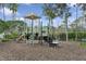 Community playground featuring a slide, stairs, and other fun amenities for children at 2582 Greenwillow Dr, Orlando, FL 32825