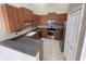 Kitchen featuring stainless steel appliances, ample cabinet space, and a breakfast bar area at 2634 Rutledge Ct, Winter Haven, FL 33884