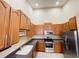 Kitchen featuring stainless steel appliances and light-colored cabinets at 2634 Rutledge Ct, Winter Haven, FL 33884