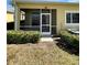 Screened patio with privacy hedge creates a relaxing outdoor space at 2634 Rutledge Ct, Winter Haven, FL 33884