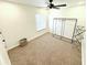 Neutral bedroom with carpet, fan and a spacious walk in closet at 2674 Kingsdale Dr, Deltona, FL 32738