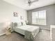 Carpeted bedroom with natural light from a large window, neutral paint at 3175 Feltrim Pl # 304, Kissimmee, FL 34747